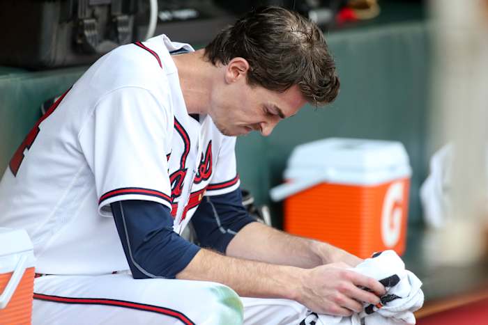 Oct 11, 2022; Atlanta, Georgia, USA; Atlanta Braves starting pitcher Max Fried (54) sits in the dugout after being pulled against the Philadelphia Phillies in the fourth inning during game one of the NLDS for the 2022 MLB Playoffs at Truist Park.